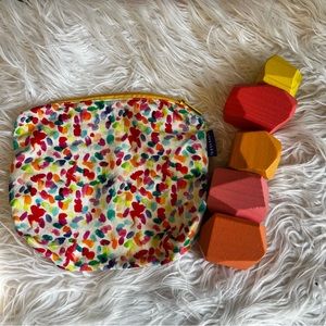 Lovevery stacking stones with storage pouch - like new.